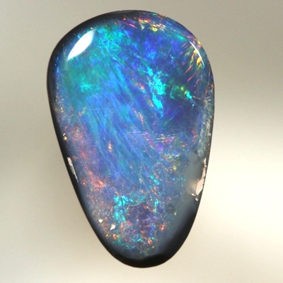 SOLID BLACK OPAL Bright reds over blues